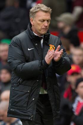 David Moyes, manager of Manchester United trudges down the pitch following defeat - Manchester United vs. Newcastle United - Barclays Premier League - Old Trafford - Manchester - 04 12 2013 Pic Philip Oldham Sportimage EDITORIAL USE ONLY. No use with unauthorised audio, video, data, fixture lists, club league logos or live services. Online in-match use limited to 120 images, no video emulation. No use in betting, games or single club league player publications.