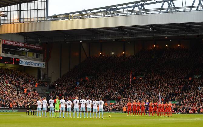 West Ham and Liverpool players hold a minutes applause in memory of Nelson Mandela - Barclays Premier League - Liverpool vs West Ham Utd - Anfield Stadium - Liverpool - England - 7th December 2013 - Picture Simon Bellis Sportimage EDITORIAL USE ONLY. No use with unauthorised audio, video, data, fixture lists, club league logos or live services. Online in-match use limited to 120 images, no video emulation. No use in betting, games or single club league player publications.