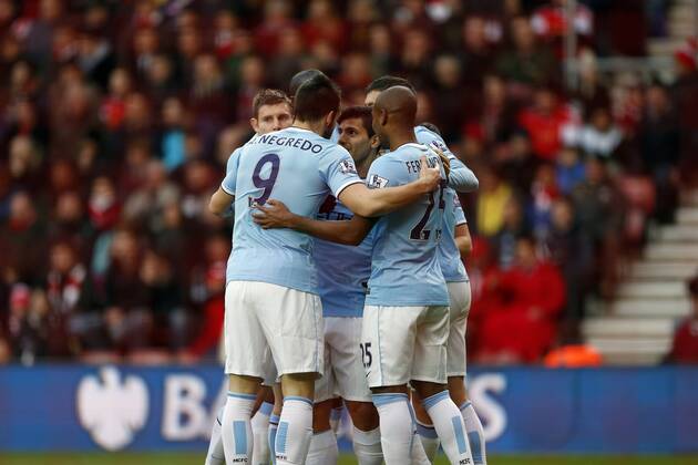 Manchester City s Sergio Kun Aguero celebrates scoring his sides opening goal Southampton v Manchester City - Premier League - St Mary s - Southampton - 07 12 2013 - Pic David Klein Sportimage EDITORIAL USE ONLY. No use with unauthorised audio, video, data, fixture lists, club league logos or live services. Online in-match use limited to 120 images, no video emulation. No use in betting, games or single club league player publications.