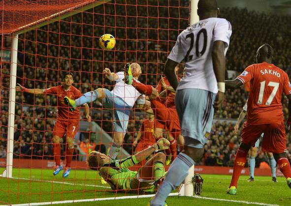 James Collins of West Ham United turns the ball into his own net for the second goal - Barclays Premier League - Liverpool vs West Ham Utd - Anfield Stadium - Liverpool - England - 7th December 2013 - Picture Simon Bellis Sportimage EDITORIAL USE ONLY. No use with unauthorised audio, video, data, fixture lists, club league logos or live services. Online in-match use limited to 120 images, no video emulation. No use in betting, games or single club league player publications.