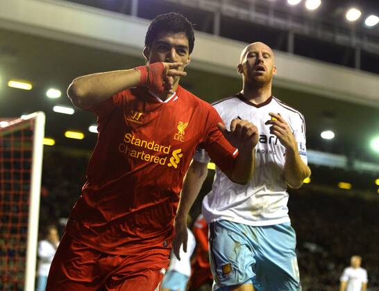 Luis Suarez of Liverpool celebrates the third goal - Barclays Premier League - Liverpool vs West Ham Utd - Anfield Stadium - Liverpool - England - 7th December 2013 - Picture Simon Bellis Sportimage EDITORIAL USE ONLY. No use with unauthorised audio, video, data, fixture lists, club league logos or live services. Online in-match use limited to 120 images, no video emulation. No use in betting, games or single club league player publications.