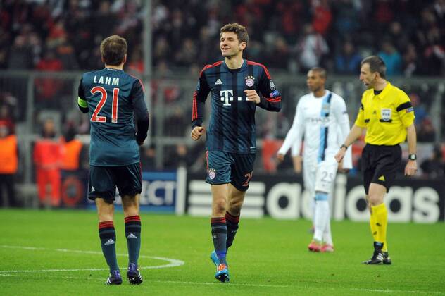 Thomas Müller (FC Bayern München) freut sich nach seinem fruehen Tor in der 4.Minute. Links Philipp Lahm (FC Bayern München). Bayern München - Manchester City, Champions League, Vorrunde, 10.12.2013 Foto: EIBNER Bayern München - Manchester City, Champions League, Vorrunde, 10.12.2013 Foto: EIBNER