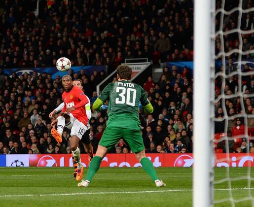 Ashley Young of Manchester United lifts the ball over Andriy Pyatov of Shakhtar Donetsk only for it to go past the post - UEFA Champions League Group A - Manchester Utd vs Shakhtar Donetsk - Old Trafford Stadium - Manchester - England - 10 12 13 - Picture Simon Bellis Sportimage EDITORIAL USE ONLY. No use with unauthorised audio, video, data, fixture lists, club league logos or live services. Online in-match use limited to 120 images, no video emulation. No use in betting, games or single club league player publications.