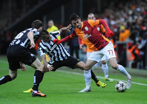 UEFA Champions League group B match between Galatasaray Istanbul and Juventus at Turk Telekom Arena Stadium on December 10, 2013 in Istanbul, Turkey. Pictured: Arturo Vidal of Juventus and Albert Riera (R) of Galatasaray. 