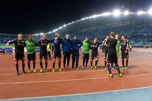 San Sebastian, Spain. 10th December 2013 Players of Bayer celebrating. UEFA Champions League Group A match between Real Sociedad and Bayer 04 Leverkusen at Anoeta Stadium 