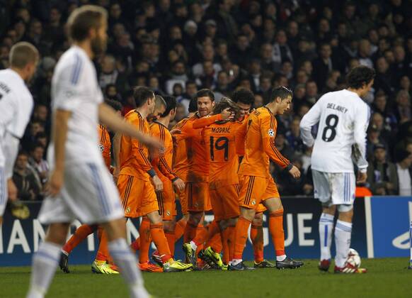 Champions League match between FC Copenhagen and Real Madrid. In this picture, Luka Modric (2.R) and Xabi Alonso (C) celebrates. xCHEMAxREYx 