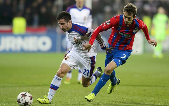 Zoran Tosic (left, CSKA) and Tomas Horava (Pilsen) during the 6th round Champions League match FC Viktoria Plzen vs CSKA Moscow played in Pilsen, Czech Republic, on December 10, 2013. (CTKxPhoto MichalxKamaryt) CTKPhotoP201312100921301  kmt 5