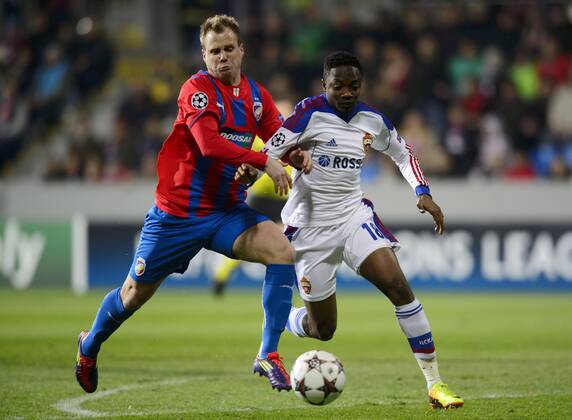 David Limbersky (left, Pilsen) and Ahmed Musa (CSKA) during the 6th round Champions League match FC Viktoria Plzen vs CSKA Moscow played in Pilsen, Czech Republic, on December 10, 2013. (CTKxPhoto MichalxKamaryt) CTKPhotoP201312100915001  kmt 2