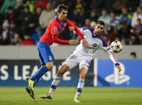 Tomas Horava (left, Pilsen) and Georgi Milanov (CSKA) during the 6th round Champions League match FC Viktoria Plzen vs CSKA Moscow played in Pilsen, Czech Republic, on December 10, 2013. (CTKxPhoto MichalxKamaryt) CTKPhotoP201312100940301  kmt 6