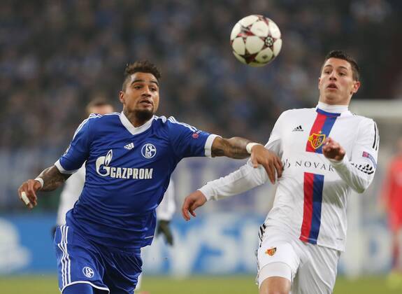 11.12.2013, xtvx, Fussball Champions League, FC Schalke 04 - FC Basel, v.l. Zweikampf, Duell, duel, tackle, compete Kevin-Prince Boateng (FC Schalke 04) Fabian Schär (FC Basel)