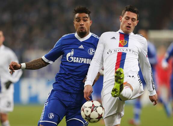11.12.2013, xtvx, Fussball Champions League, FC Schalke 04 - FC Basel, v.l. Zweikampf, Duell, duel, tackle, compete Kevin-Prince Boateng (FC Schalke 04) Fabian Schär (FC Basel)