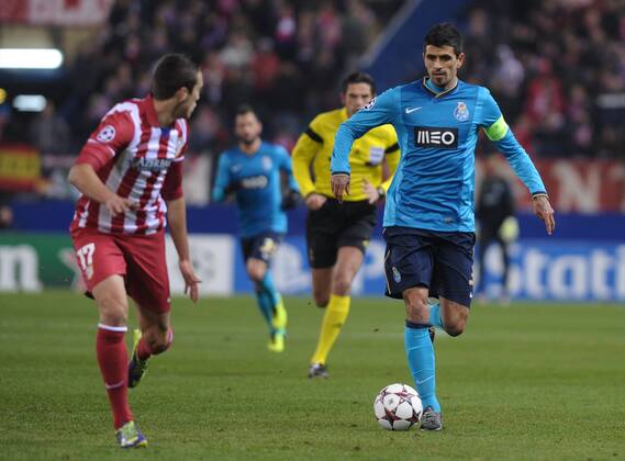 FC Porto Midfielder, number 3 LUCHO - Lucho (31), Atletico de Madrid Defender, number 17 MANQUILLO - Javier Manquillo Gaitan (18) during round 6 of the CHAMPIONS LEAGUE league, soccer match between Atletico de Madrid - FC Porto at the Vicente Calderon estadium, Madrid - December 11, 2013. 