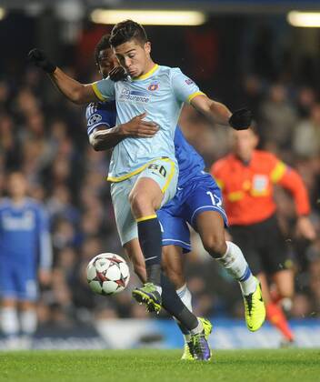 Football - 2013 2014 Champions League - Chelsea v Steaua Bucharest Gabriel Iancu - Steaua John Obi Mikel - Chelsea at Stamford Bridge. COLORSPORT ANDREW COWIE 