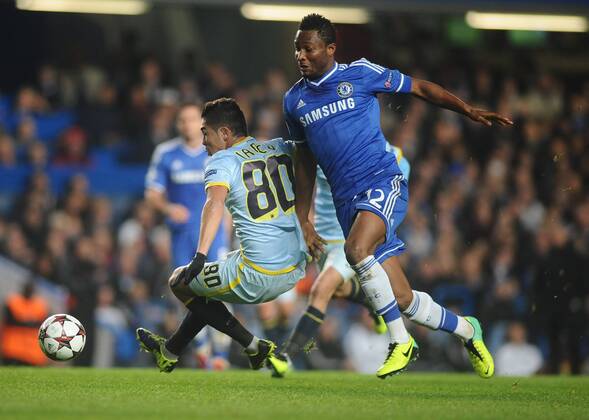 Football - 2013 2014 Champions League - Chelsea v Steaua Bucharest Gabriel Iancu - Steaua John Obi Mikel - Chelsea at Stamford Bridge. COLORSPORT ANDREW COWIE 