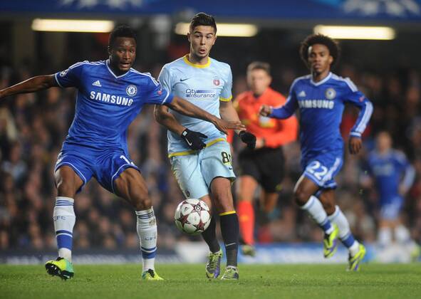 Football - 2013 2014 Champions League - Chelsea v Steaua Bucharest Gabriel Iancu - Steaua John Obi Mikel - Chelsea at Stamford Bridge. COLORSPORT ANDREW COWIE 