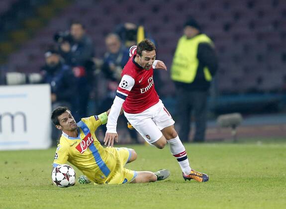 Napoli s Christian Maggio tussles with Arsenal s Santi Cazorla Napoli v Arsenal - UEFA Champions League - San Paolo Stadium - Naples - Italy - 11 12 2013 - Pic David Klein Sportimage EDITORIAL USE ONLY. No use with unauthorised audio, video, data, fixture lists, club league logos or live services. Online in-match use limited to 120 images, no video emulation. No use in betting, games or single club league player publications.