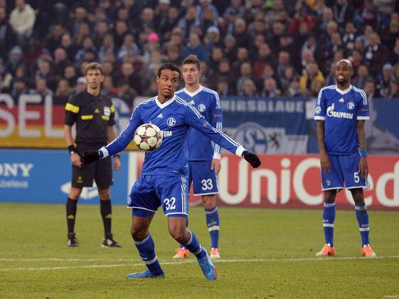 11.12.2013, xjhx, Fussball, UEFA Champions League, FC Schalke 04 - FC Basel, v.l. Joel Matip (FC Schalke 04)Goal scored, Tor zum 2:0