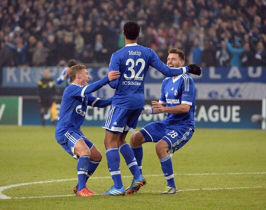 11.12.2013, xjhx, Fussball, UEFA Champions League, FC Schalke 04 - FC Basel, v.l. Max Meyer (FC Schalke 04), Joel Matip (FC Schalke 04), Adam Szalai (FC Schalke 04) Torjubel, Goal celebration, celebrate the goal 2:0