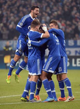 11.12.2013, xjhx, Fussball, UEFA Champions League, FC Schalke 04 - FC Basel, v.l. Joel Matip (FC Schalke 04) Torjubel, Goal celebration, celebrate the goal 2:0