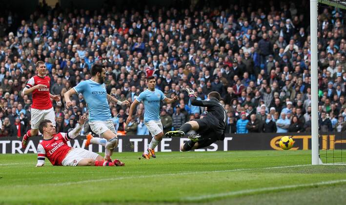 Manchester City s Alvaro Negredo scoring his sides second goal Manchester City vs Arsenal - Premier League - Etihad Stadium - Manchester - England - 14 12 2013 - Pic David Klein Sportimage EDITORIAL USE ONLY. No use with unauthorised audio, video, data, fixture lists, club league logos or live services. Online in-match use limited to 120 images, no video emulation. No use in betting, games or single club league player publications.