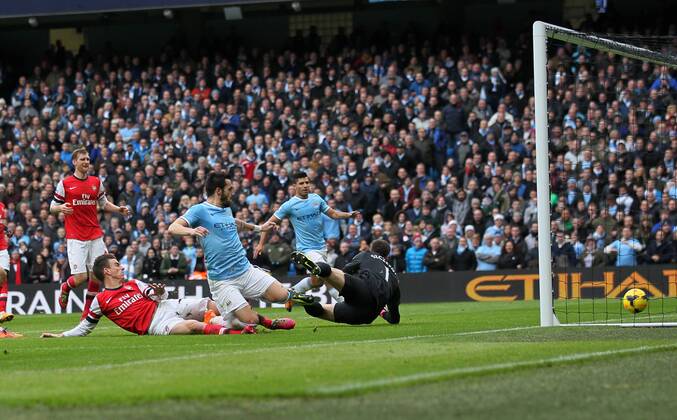 Manchester City s Alvaro Negredo scoring his sides second goal Manchester City vs Arsenal - Premier League - Etihad Stadium - Manchester - England - 14 12 2013 - Pic David Klein Sportimage EDITORIAL USE ONLY. No use with unauthorised audio, video, data, fixture lists, club league logos or live services. Online in-match use limited to 120 images, no video emulation. No use in betting, games or single club league player publications.