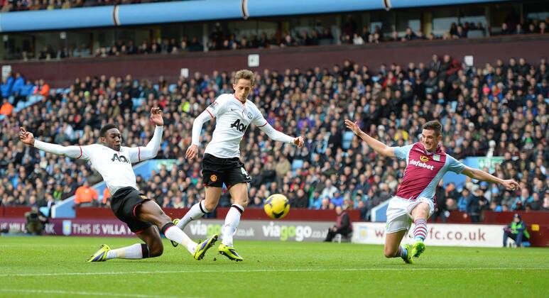 Danny Welbeck of Manchester United scores the second goal - Barclays Premier League - Aston Villa vs Manchester United (ManU) - Villa Park Stadium - Birmingham - England - 15th December 2013 - Picture SimonxBellis Sportimage EDITORIAL USE ONLY. No use with unauthorised audio, video, data, fixture lists, club league logos or live services. Online in-match use limited to 120 images, no video emulation. No use in betting, games or single club league player publications.