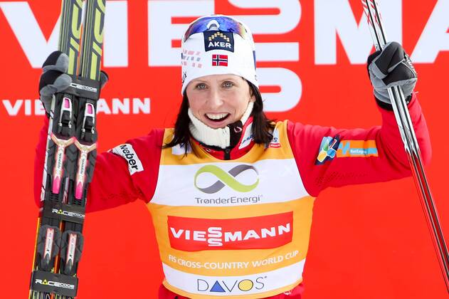 SKI NORDISCH - FIS WC Davos, 1,5km Sprint, Damen DAVOS,SCHWEIZ,15.DEZ.13 - SKI NORDISCH, LANGLAUF - FIS Weltcup, 1,5km Sprint der Damen, Freistil, Siegerehrung. Bild zeigt den Jubel von Marit Bjoergen (NOR).