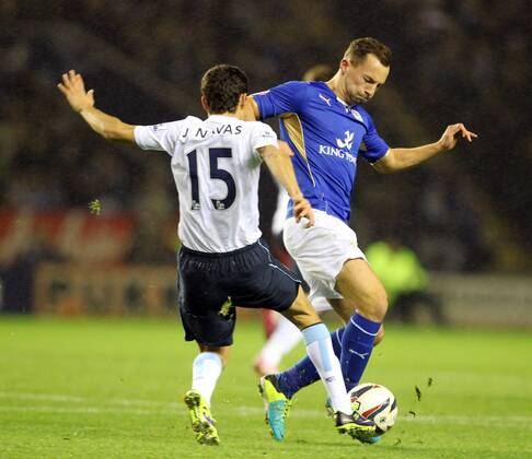 Leicester s Danny Drinkwater with Man City s Jesus Navas Capital One Cup - Leicester City v Manchester City - England - 17th December - Pic Neil Plumb Sportimage EDITORIAL USE ONLY. No use with unauthorised audio, video, data, fixture lists, club league logos or live services. Online in-match use limited to 120 images, no video emulation. No use in betting, games or single club league player publications.