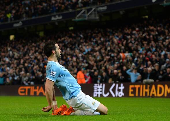 Alvaro Negredo of Manchester City celebrates scoring the second goal - Barclays Premier League - Manchester City vs Liverpool - Etihad Stadium - Manchester - England - 26th December 2013 - Picture Simon Bellis Sportimage EDITORIAL USE ONLY. No use with unauthorised audio, video, data, fixture lists, club league logos or live services. Online in-match use limited to 120 images, no video emulation. No use in betting, games or single club league player publications.