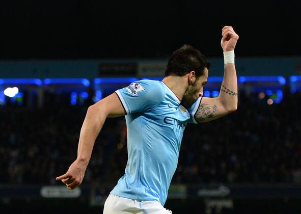 Alvaro Negredo of Manchester City celebrates scoring the second goal - Barclays Premier League - Manchester City vs Liverpool - Etihad Stadium - Manchester - England - 26th December 2013 - Picture Simon Bellis Sportimage EDITORIAL USE ONLY. No use with unauthorised audio, video, data, fixture lists, club league logos or live services. Online in-match use limited to 120 images, no video emulation. No use in betting, games or single club league player publications.