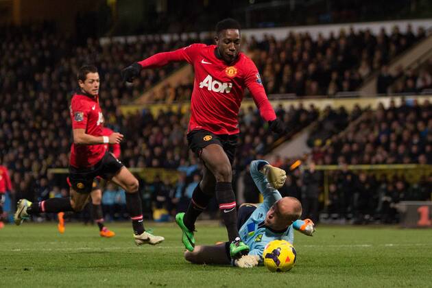 Danny Welbeck of Manchester United scores the opening goal - Norwich vs. Manchester United - Barclays Premier League - Carrow Road - Norwich - 26 12 2013 Pic Philip Oldham Sportimage EDITORIAL USE ONLY. No use with unauthorised audio, video, data, fixture lists, club league logos or live services. Online in-match use limited to 120 images, no video emulation. No use in betting, games or single club league player publications.
