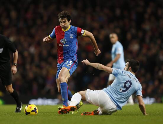 Manchester City s Alvaro Negredo tussles with Crystal Palace s Mile Jedinak Manchester City vs Crystal Palace - Premier League - Etihad Stadium - Manchester - England - 28 12 2013 - Pic David Klein Sportimage EDITORIAL USE ONLY. No use with unauthorised audio, video, data, fixture lists, club league logos or live services. Online in-match use limited to 120 images, no video emulation. No use in betting, games or single club league player publications.