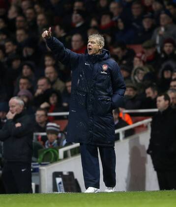 Arsenal s Arsene Wenger in action Arsenal vs Cardiff - Premier League - Emirates Stadium- London - England - 01 01 2014 - Pic David Klein Sportimage EDITORIAL USE ONLY. No use with unauthorised audio, video, data, fixture lists, club league logos or live services. Online in-match use limited to 120 images, no video emulation. No use in betting, games or single club league player publications.