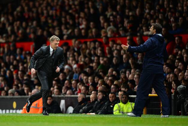 David Moyes manager of Manchester United chases after the ball in desperation - Barclays Premier League - Manchester Utd vs Tottenham - Old Trafford Stadium - Manchester - England - 1st January 2014 - Picture Simon Bellis Sportimage EDITORIAL USE ONLY. No use with unauthorised audio, video, data, fixture lists, club league logos or live services. Online in-match use limited to 120 images, no video emulation. No use in betting, games or single club league player publications.