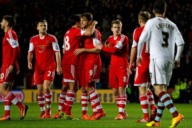 Football - 2013 2014 FA Cup - Third Round: Southampton vs. Burnley Southamptons former Burnley player Jay Rodriguez holds back his celebration after scoing Saints third at St Mary s Stadium Southampton Colorsport Shaun Boggust