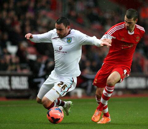 Football - 2013 2014 FA Cup - Third Round: Southampton vs. Burnley Southampton s Morgan Schneiderlin fouls Keith Treacy of Burnley Colorsport Shaun Boggust