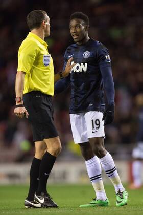 Danny Welbeck of Manchester United remonstrates with referee Andre Marriner - AFC Sunderland vs. Manchester United (ManU) - Capital One Cup Semi Final First Leg - Stadium of Light - Sunderland - 07 01 2014 EDITORIAL USE ONLY. No use with unauthorised audio, video, data, fixture lists, club league logos or live services. Online in-match use limited to 120 images, no video emulation. No use in betting, games or single club league player publications.