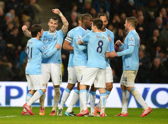 Alvaro Negredo of Manchester City celebrates his hayrick goal - Capital One Cup Semi Final 1st leg - Manchester City vs West Ham Utd - Etihad Stadium - Manchester - England - 8th January 2014 - Picture Simon Bellis Sportimage EDITORIAL USE ONLY. No use with unauthorised audio, video, data, fixture lists, club league logos or live services. Online in-match use limited to 120 images, no video emulation. No use in betting, games or single club league player publications.