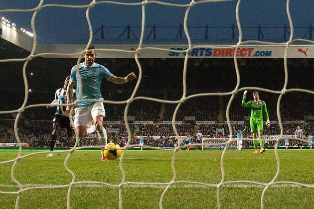 Alvaro Negredo of Manchester City scores his sides second goal - Newcastle United vs. Manchester City - Barclays Premier League - St James Park - Newcastle - 12 01 2014 EDITORIAL USE ONLY. No use with unauthorised audio, video, data, fixture lists, club league logos or live services. Online in-match use limited to 120 images, no video emulation. No use in betting, games or single club league player publications.