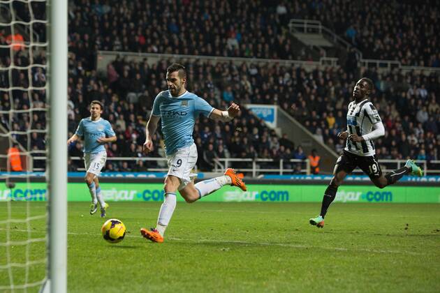 Alvaro Negredo of Manchester City scores his sides second goal - Newcastle United vs. Manchester City - Barclays Premier League - St James Park - Newcastle - 12 01 2014 EDITORIAL USE ONLY. No use with unauthorised audio, video, data, fixture lists, club league logos or live services. Online in-match use limited to 120 images, no video emulation. No use in betting, games or single club league player publications.
