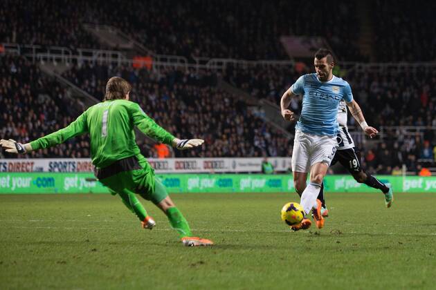 Alvaro Negredo of Manchester City scores his sides second goal - Newcastle United vs. Manchester City - Barclays Premier League - St James Park - Newcastle - 12 01 2014 EDITORIAL USE ONLY. No use with unauthorised audio, video, data, fixture lists, club league logos or live services. Online in-match use limited to 120 images, no video emulation. No use in betting, games or single club league player publications.