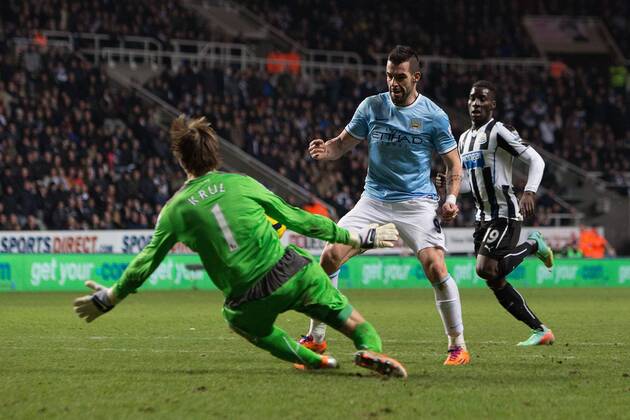 Alvaro Negredo of Manchester City scores his sides second goal - Newcastle United vs. Manchester City - Barclays Premier League - St James Park - Newcastle - 12 01 2014 EDITORIAL USE ONLY. No use with unauthorised audio, video, data, fixture lists, club league logos or live services. Online in-match use limited to 120 images, no video emulation. No use in betting, games or single club league player publications.