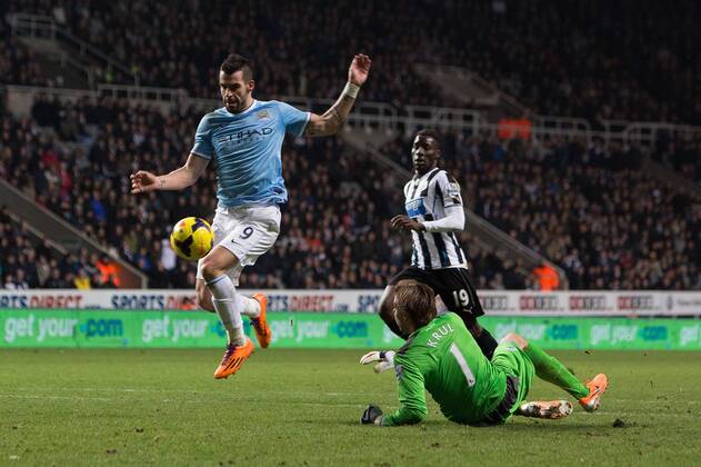 Alvaro Negredo of Manchester City scores his sides second goal - Newcastle United vs. Manchester City - Barclays Premier League - St James Park - Newcastle - 12 01 2014 EDITORIAL USE ONLY. No use with unauthorised audio, video, data, fixture lists, club league logos or live services. Online in-match use limited to 120 images, no video emulation. No use in betting, games or single club league player publications.