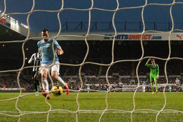 Alvaro Negredo of Manchester City scores his sides second goal - Newcastle United vs. Manchester City - Barclays Premier League - St James Park - Newcastle - 12 01 2014 EDITORIAL USE ONLY. No use with unauthorised audio, video, data, fixture lists, club league logos or live services. Online in-match use limited to 120 images, no video emulation. No use in betting, games or single club league player publications.