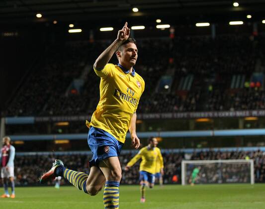 Arsenal s Olivier Giroud celebrates scoring his sides second goal Aston Villa - Arsenal FC London. Premier League - Villa Park- Birmingham - England - 13 01 2014 - PicxDavidxKleinxSportimagex EDITORIAL USE ONLY. No use with unauthorised audio, video, data, fixture lists, club league logos or live services. Online in-match use limited to 120 images, no video emulation. No use in betting, games or single club league player publications.