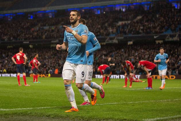 Alvaro Negredo of Manchester City celebrates his opening goal - Manchester City vs. Blackburn Rovers - FA Cup Third Round Replay - Etihad Stadium - Manchester - 15 01 2014 Pic Philip Oldham Sportimage EDITORIAL USE ONLY. No use with unauthorised audio, video, data, fixture lists, club league logos or live services. Online in-match use limited to 120 images, no video emulation. No use in betting, games or single club league player publications.