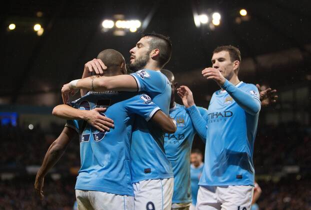 Alvaro Negredo of Manchester City celebrates his opening goal - Manchester City vs. Blackburn Rovers - FA Cup Third Round Replay - Etihad Stadium - Manchester - 15 01 2014 Pic Philip Oldham Sportimage EDITORIAL USE ONLY. No use with unauthorised audio, video, data, fixture lists, club league logos or live services. Online in-match use limited to 120 images, no video emulation. No use in betting, games or single club league player publications.