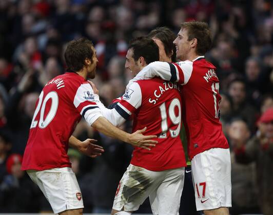 Arsenal s Santi Cazorla celebrates scoring his sides second goal - Arsenal FC London vs Fulham FC - - Premier League - Emirates Stadium- London - England - 18 01 2014 - Pic DavidKlein Sportimage EDITORIAL USE ONLY. No use with unauthorised audio, video, data, fixture lists, club league logos or live services. Online in-match use limited to 120 images, no video emulation. No use in betting, games or single club league player publications.