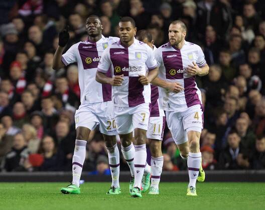 Christian Benteke of Aston Villa celebrates scoring his sides second goal - Liverpool FC vs. Aston Villa - Barclays Premier League - Anfield - Liverpool - 18 01 2014 Pic PhilipxOldham Sportimage EDITORIAL USE ONLY. No use with unauthorised audio, video, data, fixture lists, club league logos or live services. Online in-match use limited to 120 images, no video emulation. No use in betting, games or single club league player publications.