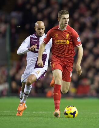 Karim El Ahmadi of Aston Villa chases Jordan Henderson of Liverpool - Liverpool FC vs. Aston Villa - Barclays Premier League - Anfield - Liverpool - 18 01 2014 Pic PhilipxOldham Sportimage EDITORIAL USE ONLY. No use with unauthorised audio, video, data, fixture lists, club league logos or live services. Online in-match use limited to 120 images, no video emulation. No use in betting, games or single club league player publications.